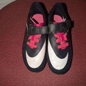 Size 13 Nike Kids Black and Pink Soccer Cleats